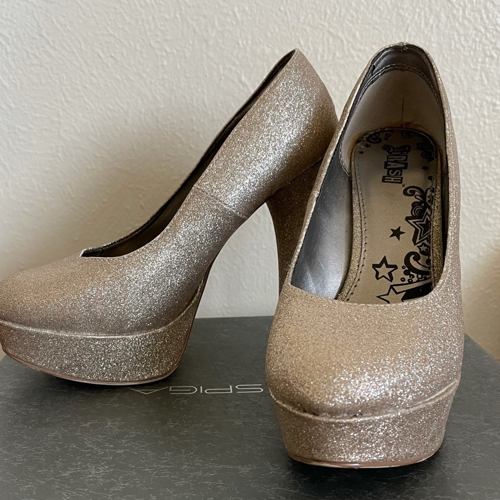 Brash gold glitter platform pumps